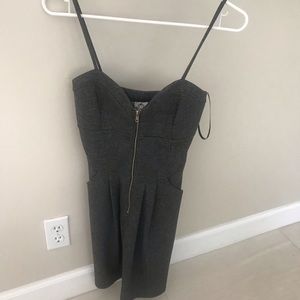 Mini dress with pockets and gold statement zipper